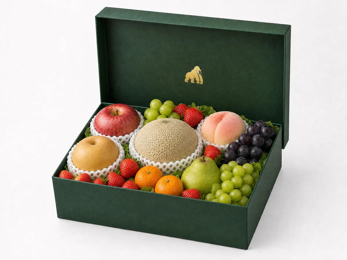 Green Gorilla Fruits Premium Plus tier gift box centered on large premium fruits