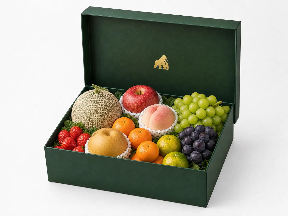 Green Gorilla Fruits VIP tier gift box with abundant melon, grapes, peach, pear, citrus, and strawberry